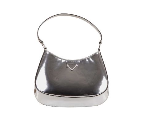 Prada, a metallic silver Cleo hobo handbag, designed with a smooth silver leather exterior, featuring the maker's signature f