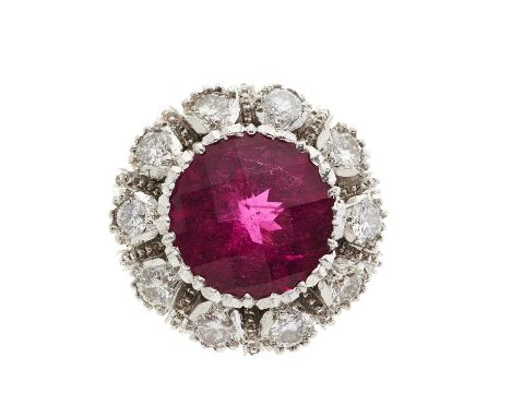 An 18ct gold pink tourmaline and brilliant-cut diamond cluster ring, tourmaline estimated weight 6ct, estimated total diamond