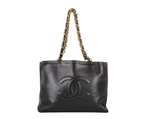 Chanel, a vintage Jumbo XL shopping tote, crafted from smooth black calfskin leather, featuring the maker's central CC front 