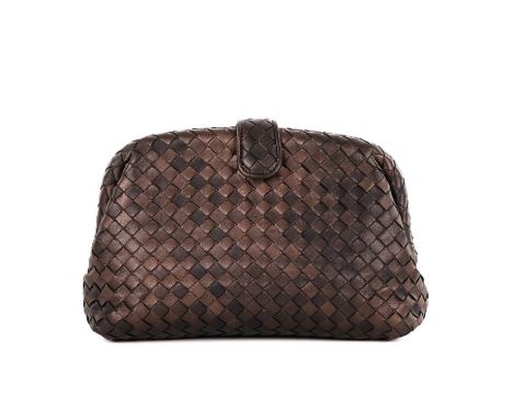 Bottega Veneta, a The Lauren 1980 clutch, crafted from the maker's signature woven intrecciato metallic bronze leather, with 