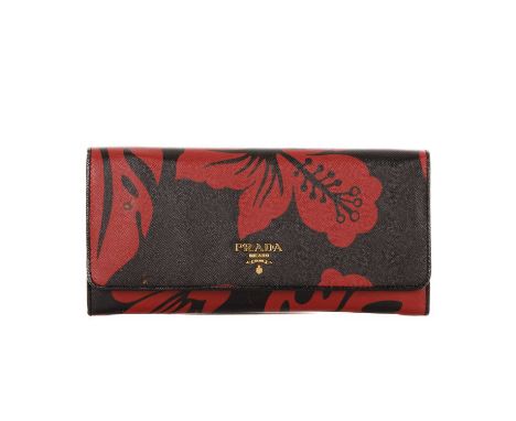 Prada, a Wallet On Chain handbag, featuring a red and black patterned saffiano leather exterior, with gold-tone hardware, det