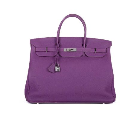Hermes, a 2014 purple Birkin 40 handbag, featuring a pebbled leather exterior, palladium hardware, dual rolled handles, top f