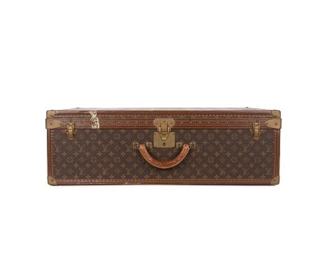 Louis Vuitton, a monogram Alzer 80 hard suitcase, featuring the maker's monogram coated canvas exterior with logo stamped tri