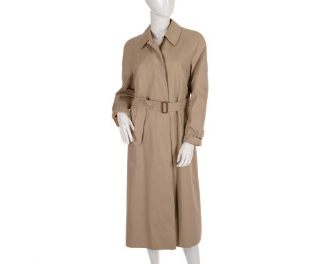 Burberry, a ladies beige overcoat, featuring a short collar, concealed front button fastenings, optional belt, two outer pock