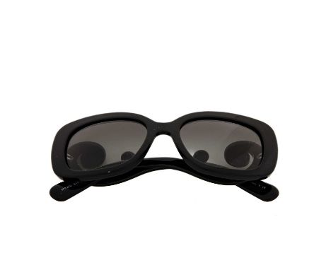 Prada, a pair of sunglasses, featuring grey gradient lenses, black acetate frames, and spiral detailing to each arm, with mak