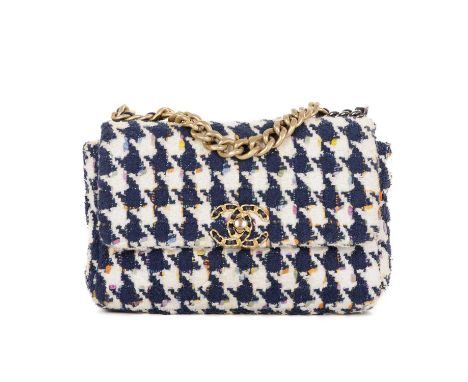 Chanel, a Houndstooth Tweed 19 Flap handbag, featuring a white and navy tweed patterned exterior, featuring multicoloured wov