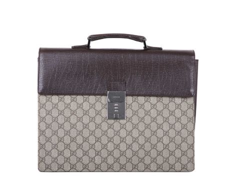 Gucci, a Supreme GG briefcase, featuring the maker's GG coated canvas exterior, with brown-grained leather trim, featuring a 