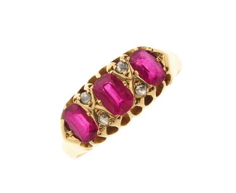 An Edwardian 18ct gold ruby three-stone dress ring, with rose-cut diamond double spacers, hallmarks for Chester 1901, ring si
