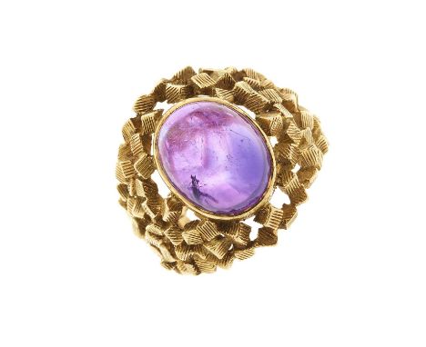 John Donald (attributed), a 1960s 18ct gold amethyst cabochon single-stone ring, with geometric openwork tapered band, hallma