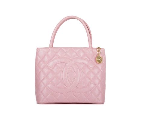 Chanel, a Timeless Medallion tote, crafted from pink caviar leather with the maker's classic diamond quilting and a large app