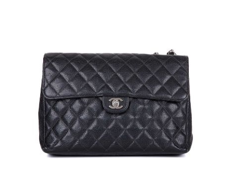 Chanel, a Classic Single Flap handbag, designed with a black diamond quilted caviar leather exterior, with polished silver-to