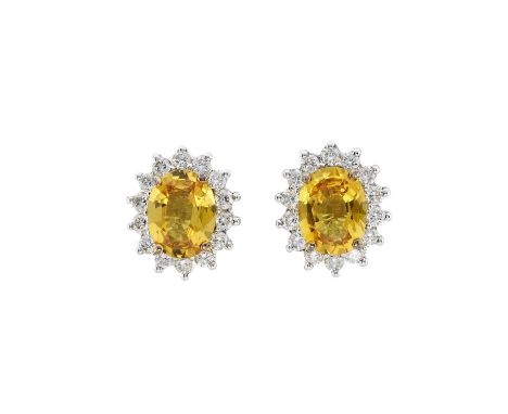 A pair of 18ct gold yellow sapphire and brilliant-cut diamond cluster stud earrings, estimated total sapphire weight 4.20ct, 