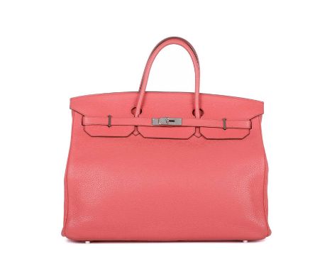 Hermes, a 2010 coral pink Birkin 40 handbag, featuring a pebbled leather exterior, palladium hardware, dual rolled handles, t