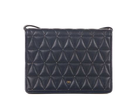 Valentino, a vintage studded crossbody bag, crafted from navy blue calf leather, featuring a triangular quilted front flap wi