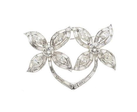 A 14ct gold vari-cut diamond flower brooch, estimated total diamond weight 12ct, principal two diamonds estimated total weigh