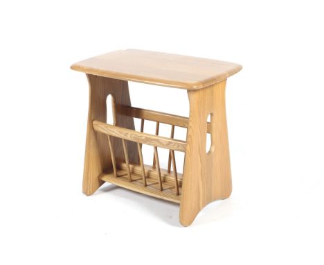 An Ercol blonde oak magazine rack side table. L55cm x D36cm x H50cm