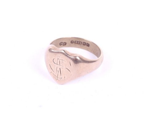 A 9ct gold shield shaped signet ring. Hallmarks for D& F, Birmingham 1954. Size P, weight 7.1g, boxed. 