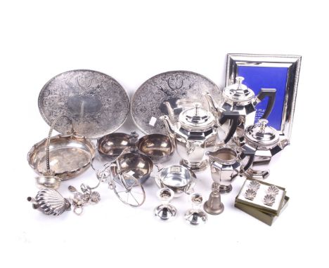 A collection of silver plate and metalware. Including pierced trays, a photograph frame, boxed Christofle knife rests, a thre
