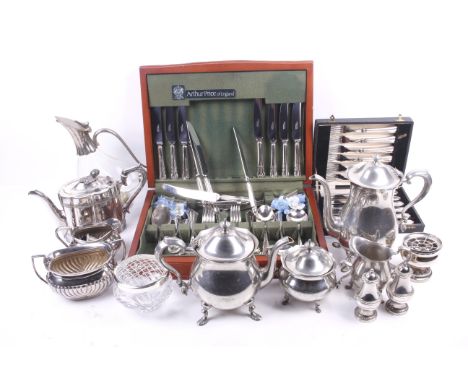 A collection of silver plate. Including a James Deakin teapot, posy holders, a claret jug, flatware and more