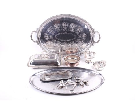 A collection of silverplate. Including a large oval twin handled tray, a rectangular tureen, teaspoons, a napkin ring and mor