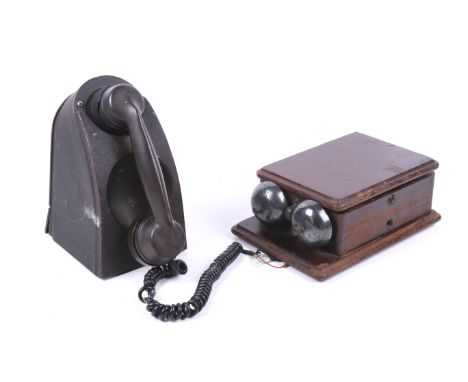 A vintage Fonadek telephone and a bell set. The telephone S/N 11511, H23cm, the bell secured in a wooden box and having a set