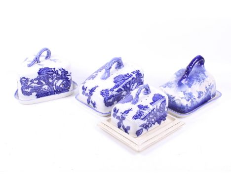 Four Victorian and later ceramic cheese dishes. All glazed in blue and white, including two Ironstone Staffordshire 'Blakeney
