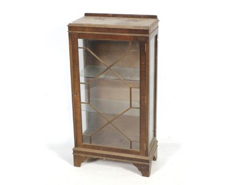 A Georgian style astral glazed mahogany display cabinet. With two glass shelves, raised on bracket supports. L58cm x D31cm x 