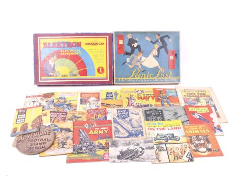 An assortment of ephemera and vintage games. Including Chad Valley 'Panic Post', Hotspur handy Books, Meccano 'Elektron Elect