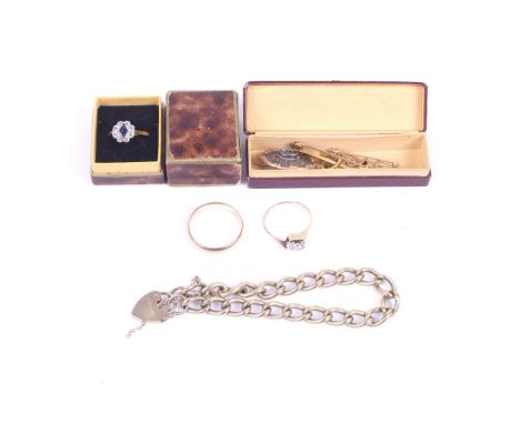 A small group of gold and other jewellery. Including a 9ct gold ring set with two white stones, a 9ct gold chain bracelet wit