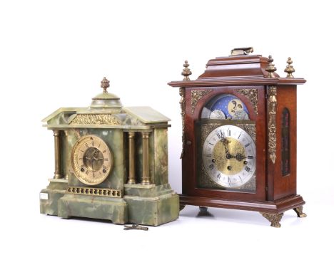 Two contemporary mantel clocks. Comprising an alabaster clock, the gilt dial with Roman numerals, the case of architectural f
