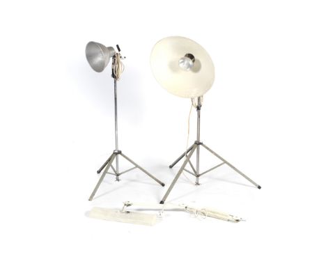 Three large vintage lights. Comprising an adjustable wall light and two adjustable Photax floor lamps on tripod bases