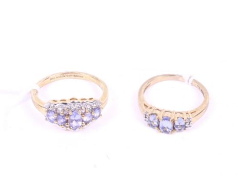 Two modern tanzanite rings. Comprising; a 9ct gold and oval tanzanite three stone ring. With small diamond two-stone terminal