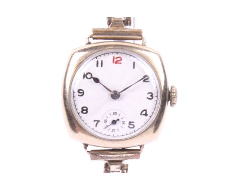 Longines, a lady's 9ct gold cushion-cased wrist-watch on a rolled-gold bracelet. The white enamel dial with a red 12 and blac