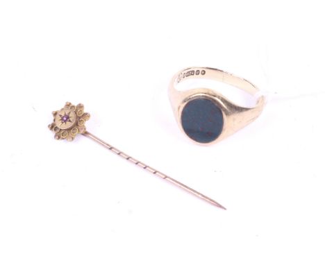 A 9ct gold signet ring and a tie pin. The ring set with an oval heliotrope, the ring with hallmarks for London 1983, weight 4