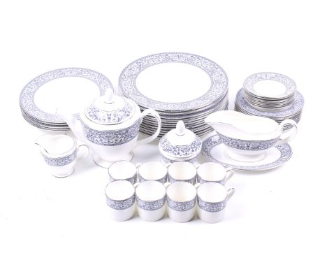 A Minton Infanta bone china coffee and dinner service. Including 14 dinner plates (27cm diameter), 8 coffee cans, a tea pot a