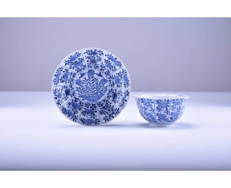 A Chinese blue and white bowl and stand from the Vung Tau cargo, KangxiOf lobed form and decorated with panels of dense flowe