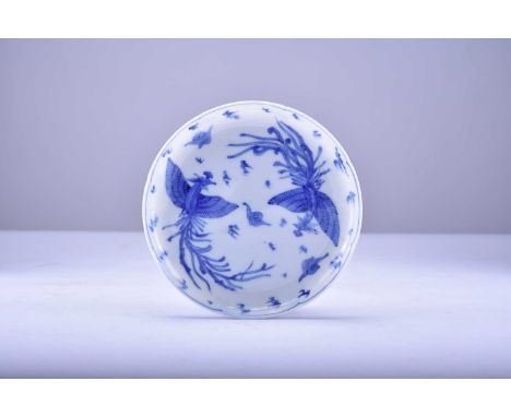 A Chinese blue and white dish, 18th century, possibly KangxiOf lobed form and decorated with a pair of phoenix birds in fligh