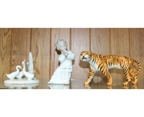 TWO LLADRO FIGURAL GROUPS AND A BESWICK PROWLING TIGERCondition: Geese item is Nao not Lladro, condition good.