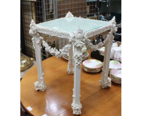 A DECORATIVELY PAINTED SQUARE TOPPED LAMP TABLE, with profusley moulded swag decoration 