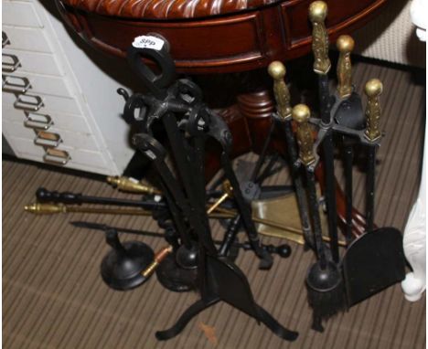 A FOLDING MESH SPARK GUARD complete with a selection of fireside tools 