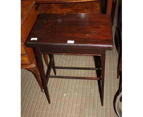 A MAHOGANY FINISHED SWIVEL TOPPED CARD TABLE on plain tapering legs 