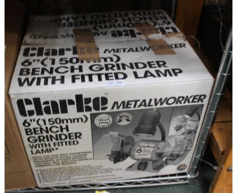 A BOXED CLERK'S BRANDED 6'' BENCH GRINDER with fitted task lamp 