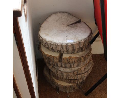 A SELECTION OF GARDEN STEPPING STONES cut from a single tree trunk 