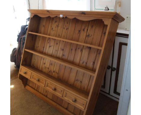 A WALL HANGING SET OF PINE STORAGE SHELVES with four inline spice drawers 