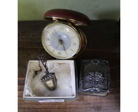 A NOVELTY PASTE BROOCH TIMEPIECE in the form of a hanging lantern, together with a hallmarked silver covered book of common P