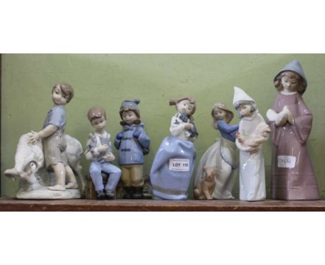 A SHELF CONTAINING SEVEN SPANISH PORCELAIN FIGURINES 