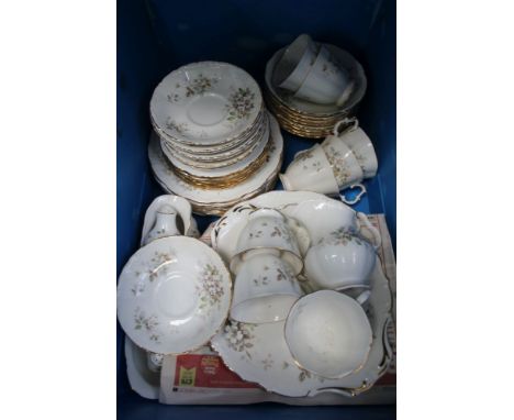 A BLUE CRATE CONTAINING A ROYAL ALBERT 'HAWORTH' PATTERNED PART TEA SERVICE 