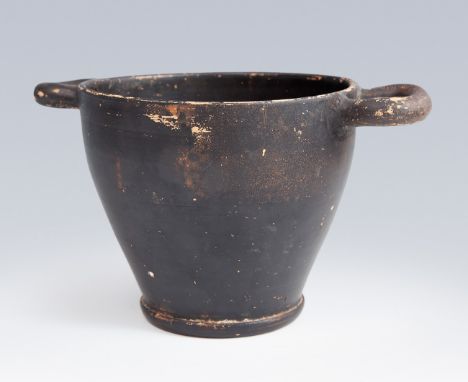 Etruscan Skyphos; 3rd century B.C. Black buccaneer ceramic. Measures: 14 x 24,5 x 16 cm. The bucchero is a type of black pott