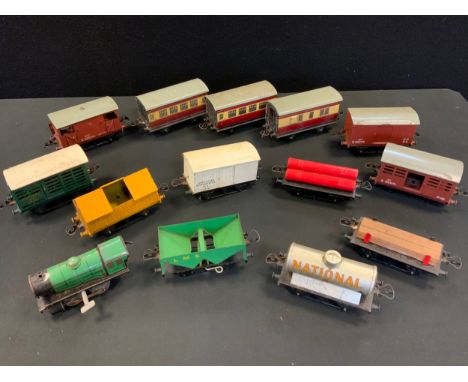 Toys &amp; Juvenalia - a collection of Hornby O Gauge rolling stock, mostly wagons and vans, including a Blue Circle Portland