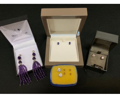 A pair of QVC tanzanite purple 9ct white gold set earrings;  others Clogau 925 silver and gold cz studs;  Rocks &amp; Co bead